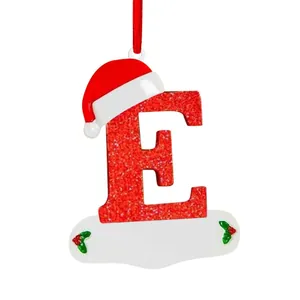 Red glitter Christmas letter E ornament with Santa hat and hanging ribbon