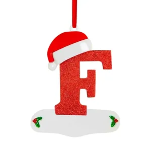 Red glitter Christmas letter F ornament with Santa hat for festive home and tree decoration