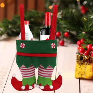 Feestelijke kerst elfenbroek cadeauzakje voor snoep en wijnfles decoratie