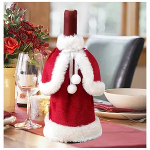 Detailed view of a Santa-style red velvet wine bottle cover with white faux fur trim
