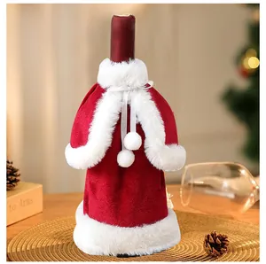 Festive red velvet Christmas wine bottle cover with white faux fur trim decoration