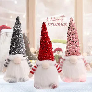 Set of three festive Christmas gnomes featuring sparkling sequin hats and fluffy white beards