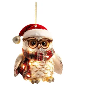 Cute owl Christmas tree ornament wearing Santa hat and scarf with warm LED lights