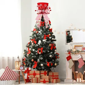 Festive red Christmas tree topper hat with candy cane and striped bow decorations