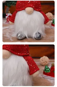 Close-up detail of a lighted Christmas gnome with red sequined hat and white beard
