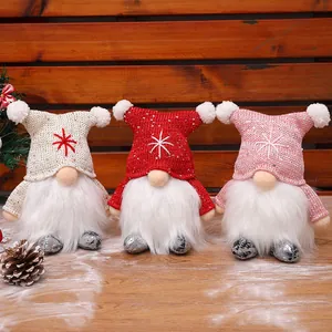 Three luminous Christmas gnomes with sequined hats and long white plush beards