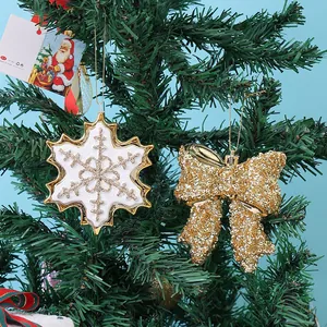 Sparkling gold glitter bow and white snowflake Christmas tree hanging ornaments for party decor