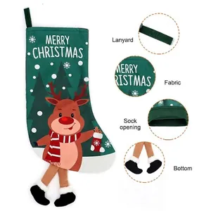 Green Christmas stocking decoration with cartoon reindeer and Merry Christmas print