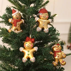 Set of 4 gold electroplated gingerbread man Christmas tree ornaments with festive scarves