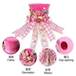 Pink velvet Christmas tree topper hat with gingerbread decorations and plaid ribbons
