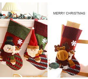 Close-up of festive Christmas stockings featuring Santa, snowman, and reindeer characters.