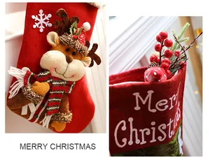 Macro close-up of festive Christmas stockings featuring reindeer and red berry ornaments.