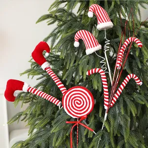 Festive set of elf legs lollipop and candy cane Christmas tree picks for holiday decor