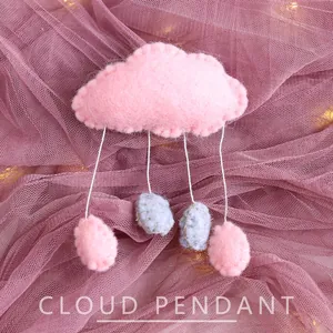 Handmade pink felt cloud pendant for Christmas tree and festive scene decoration