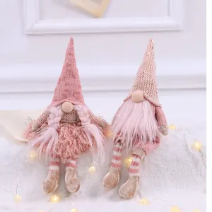 Paire de gnomes de Noël roses décoratifs avec chapeaux tricotés et guirlande LED