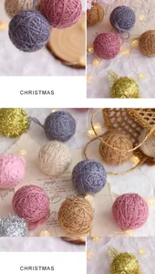Bunte handgefertigte 5-cm-Garnkugeln für die Weihnachtsbaumdekoration und DIY-Projekte.