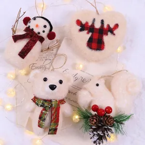 Charming white plush Christmas ornaments featuring snowman bear and elk designs