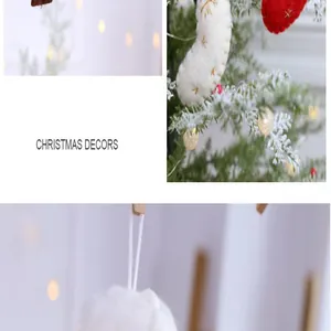 Detailed view of festive Christmas socks and plush ball ornaments on a decorated tree