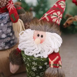 Festive Santa Claus knit candy bag and holiday gift container featuring snowflake patterns