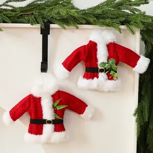 Two miniature red Santa-style knitted sweater ornaments for festive Christmas decor