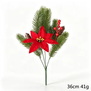 Artificial Christmas poinsettia bouquet with pine needles and red berries for home decor.
