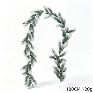 Detailed view of 180cm snowy artificial pine needle garland for Christmas wall decoration