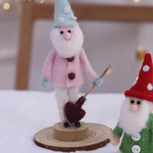 Handcrafted wool felt gnome figurines on wood base for Christmas home table decor