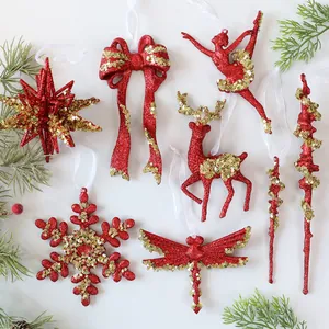 Red and gold glitter Christmas ornaments set featuring snowflake and reindeer shapes