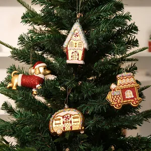 Set de 4 adornos dorados para el árbol de Navidad con perro y casita de dibujos