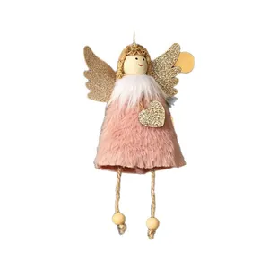 Charming pink plush Christmas angel ornament with glittery wings and a golden heart