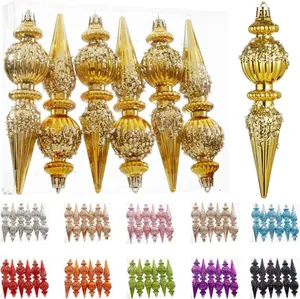 Set of gold conical Christmas ornaments shown in multiple color variations