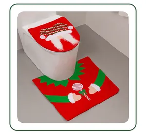 Red and green Christmas Santa toilet seat cover set with matching bathroom floor mat rug