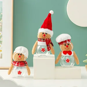 Festliche Lebkuchenmann-Zuckergläser mit Strickmützen und Schals für Weihnachtsdeko