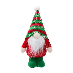 Festive Christmas gnome doll with red sequin body and green striped hat decoration