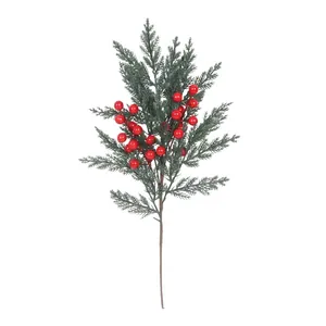 Artificial pine branch with red berries for festive Christmas floral home table decor
