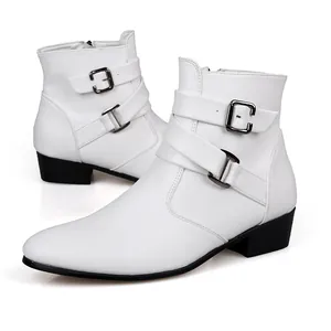 Detailed side view of white pointed-toe leather boots with decorative buckles