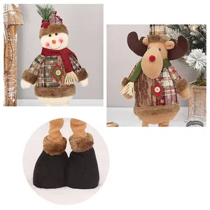 Detail views of Christmas snowman and reindeer plush dolls with plaid outfits and boots