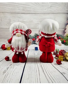 Front and back view of red and white plush Christmas chef gnomes holding candy cane