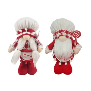Pair of festive red and white Christmas gnome plush dolls with chef hats and beards