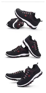 Detailed view of durable black leather hiking shoes with non-slip soles for men