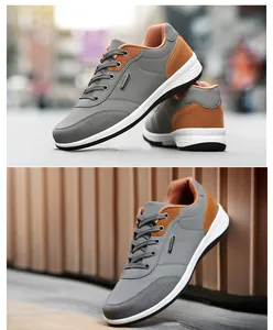 Detailed view of men's sports walking shoes featuring a non-slip soft sole and grey tan finish