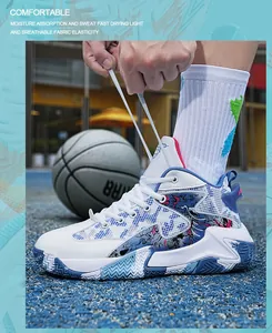 Detail view of stylish white and blue high-top basketball shoes being tied on court