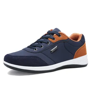 Navy blue and brown men's sports casual walking sneaker with anti-slip white sole