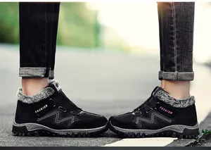 Macro detail of black fleece-lined outdoor winter boots for couples with warm plush lining