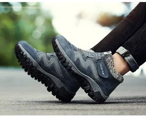 Detailed side view of blue winter outdoor cotton shoes with warm fleece lining