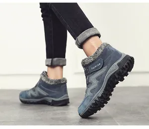 Detailed view of men's winter outdoor sports boots with warm fleece lining in blue.