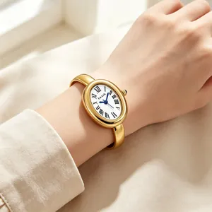 Elegant gold oval bangle watch for women with Roman numerals and blue hands