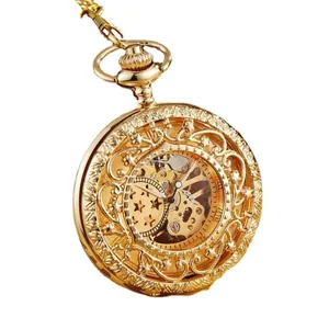 Élégante montre à gousset mécanique or vintage avec cadran squelette et motif étoile