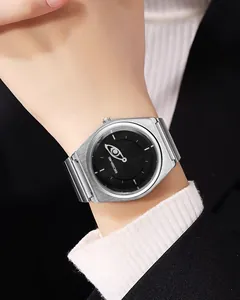 Detail view of a silver unisex quartz watch with unique Eye of God dial design.