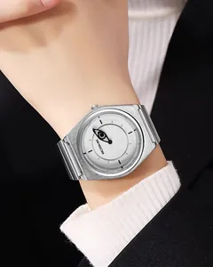 Close-up of minimalist silver quartz watch featuring a unique eye-shaped dial design
